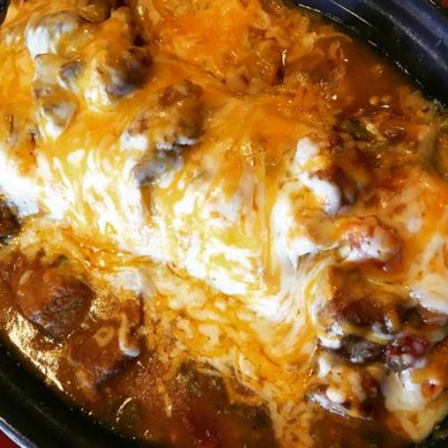 Smothered Breakfast Burrito.
